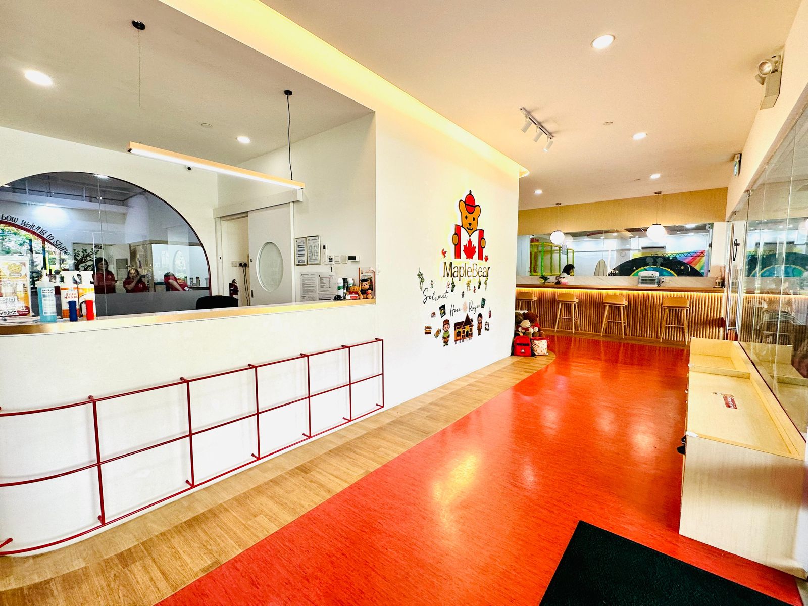Inside MapleBear Jurong Gateway — the reception and play area